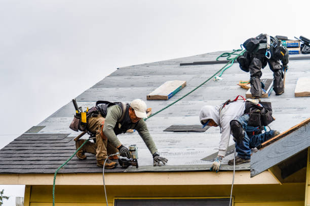 Professional Gutter Installation technician working in Raymond, ME